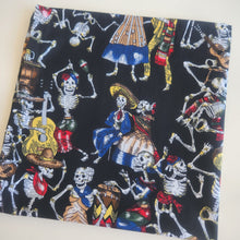 Load image into Gallery viewer, Fabric with colourful skeleton design on a black background