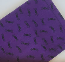 Load image into Gallery viewer, Purple paper with black spider pattern on a white background