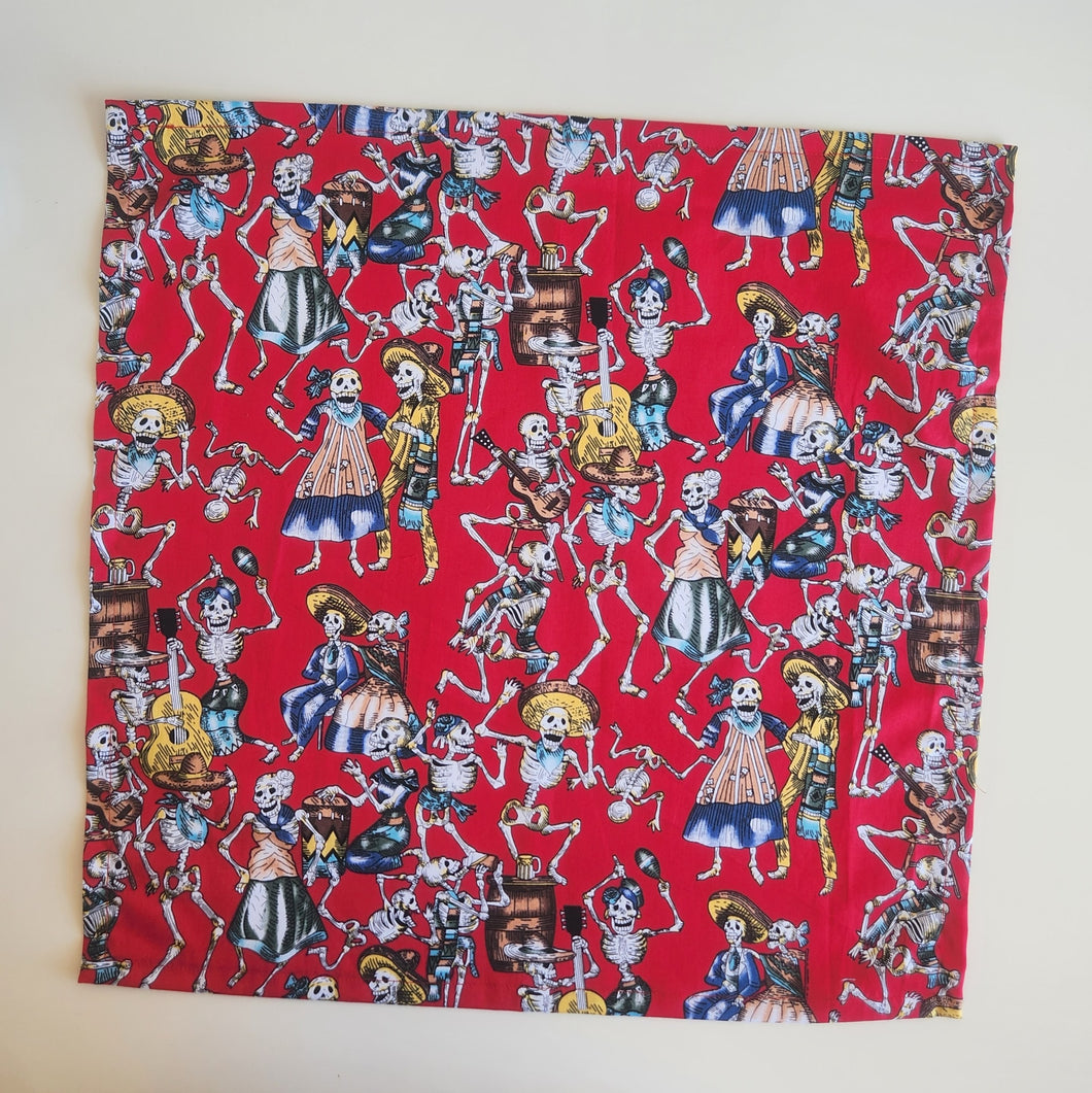 Fabric with skeleton pattern on a red background