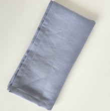 Load image into Gallery viewer, Folded linen napkins in purple blue colour