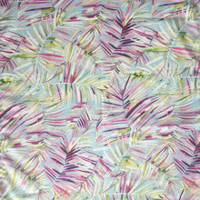 Load image into Gallery viewer, Patterned fabric with pink, green, and yellow leaves on a light blue background