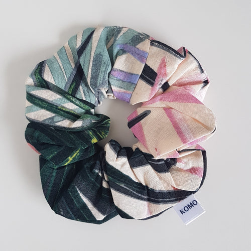 Gorgeous pastel pink and bottle green cocos palm print. Perfect scrunchie for messy bun hair. Beautiful pastel print fabric with large green palm design.