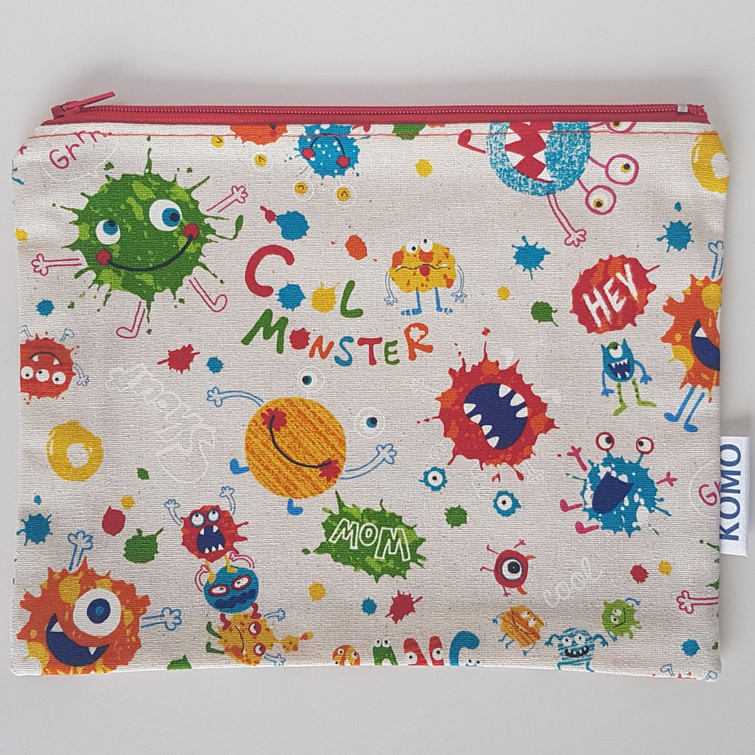 Monsters Pencil Case Fun and easy to use! A super fun monsters print with bright red lining.  A  fun girls or boys pencil case. Unique gifts for kids. Great back to school gift for kids. 