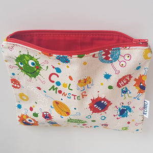Monsters Pencil Case Fun and easy to use! A super fun monsters print with bright red lining.  A  fun girls or boys pencil case. Unique gifts for kids. Great back to school gift for kids. 